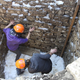 Archaeologists working in a shaft at Augusta Raurica.
